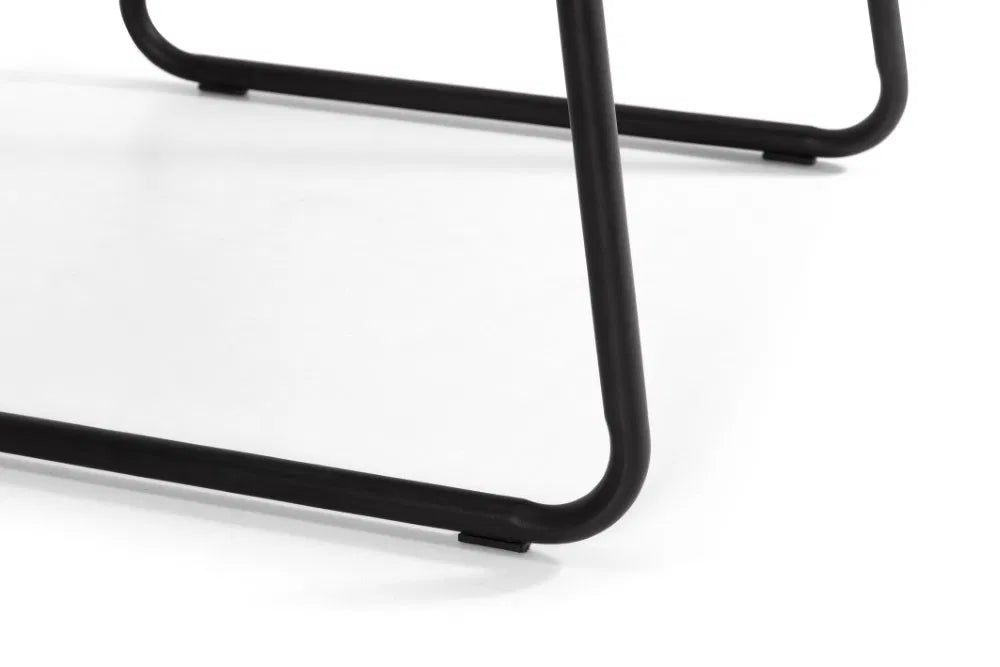 Shop these antique black faux leather dining chairs with sleek black metal frame for industrial edge. Retro styling with a modern twist – ideal for urban interiors. Shop online today at www.nobleandnook.co.uk