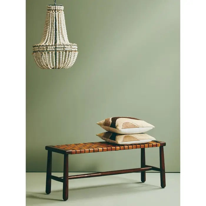 Shop the elegant mid-century inspired bench, combining artisanal craftsmanship and timeless design with tan leather straps arranged in a stunning basket weave lattice pattern. Shop online today at www.nobleandnook.co.uk