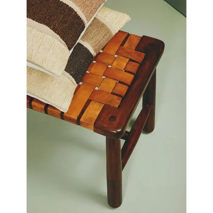 Shop the elegant mid-century inspired bench, combining artisanal craftsmanship and timeless design with tan leather straps arranged in a stunning basket weave lattice pattern. Shop online today at www.nobleandnook.co.uk