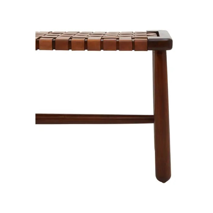 Shop the elegant mid-century inspired bench, combining artisanal craftsmanship and timeless design with tan leather straps arranged in a stunning basket weave lattice pattern. Shop online today at www.nobleandnook.co.uk