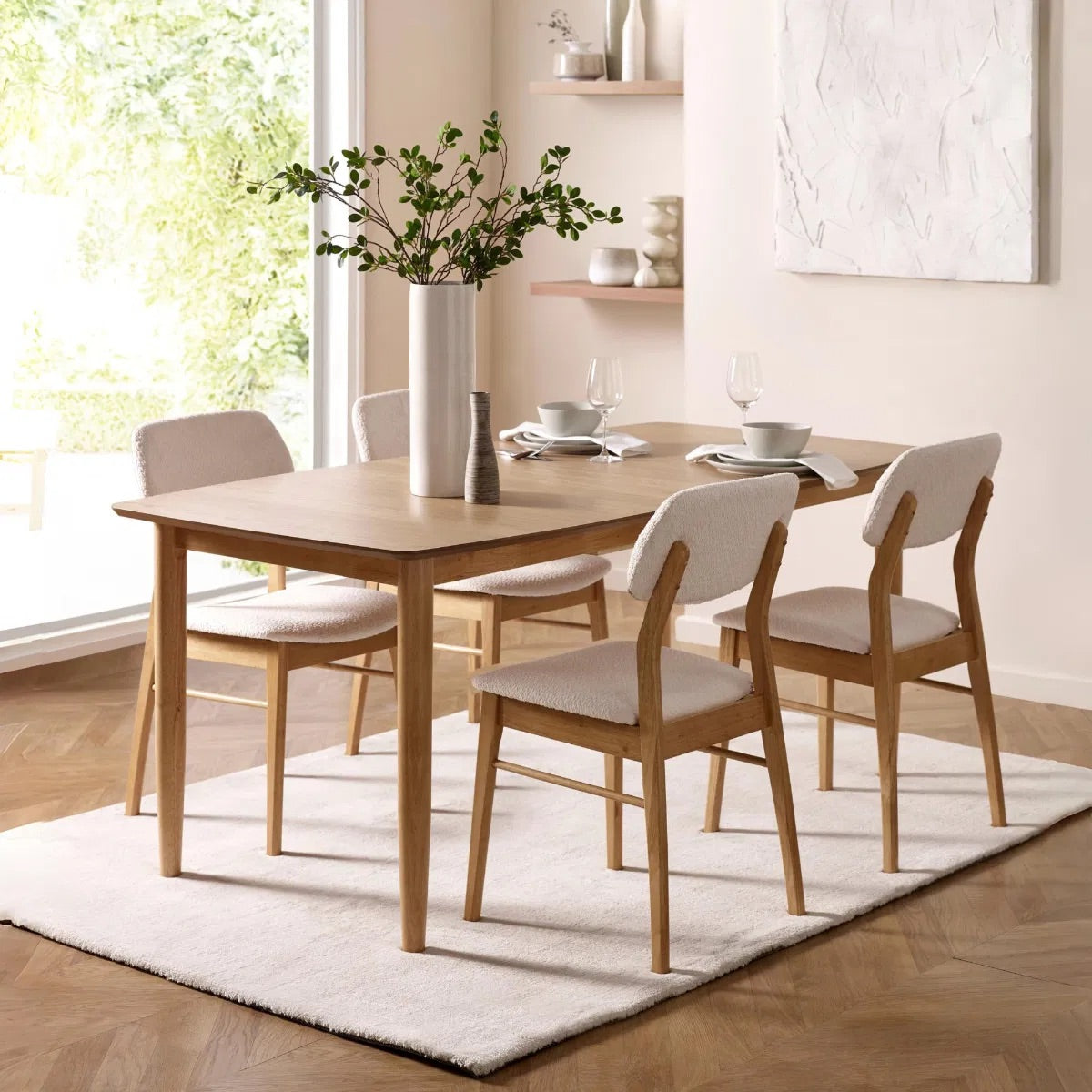 Dimensions: H85 x W56 x D45 cm. Luxurious White Boucle Upholstery adds a rich, tactile finish that feels both inviting and sophisticated. Ergonomically designed for lasting comfort and support during long meals and conversations.