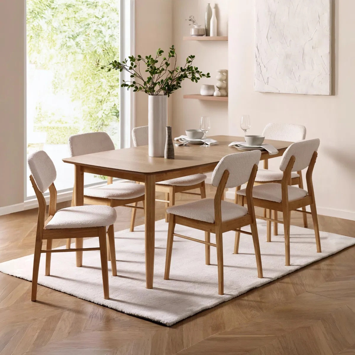 Dimensions: H85 x W56 x D45 cm. Luxurious White Boucle Upholstery adds a rich, tactile finish that feels both inviting and sophisticated. Ergonomically designed for lasting comfort and support during long meals and conversations.