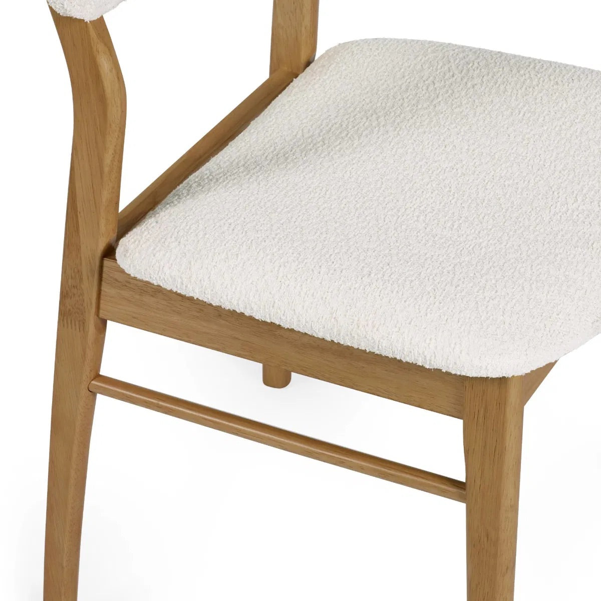 Dimensions: H85 x W56 x D45 cm. Luxurious White Boucle Upholstery adds a rich, tactile finish that feels both inviting and sophisticated. Ergonomically designed for lasting comfort and support during long meals and conversations.