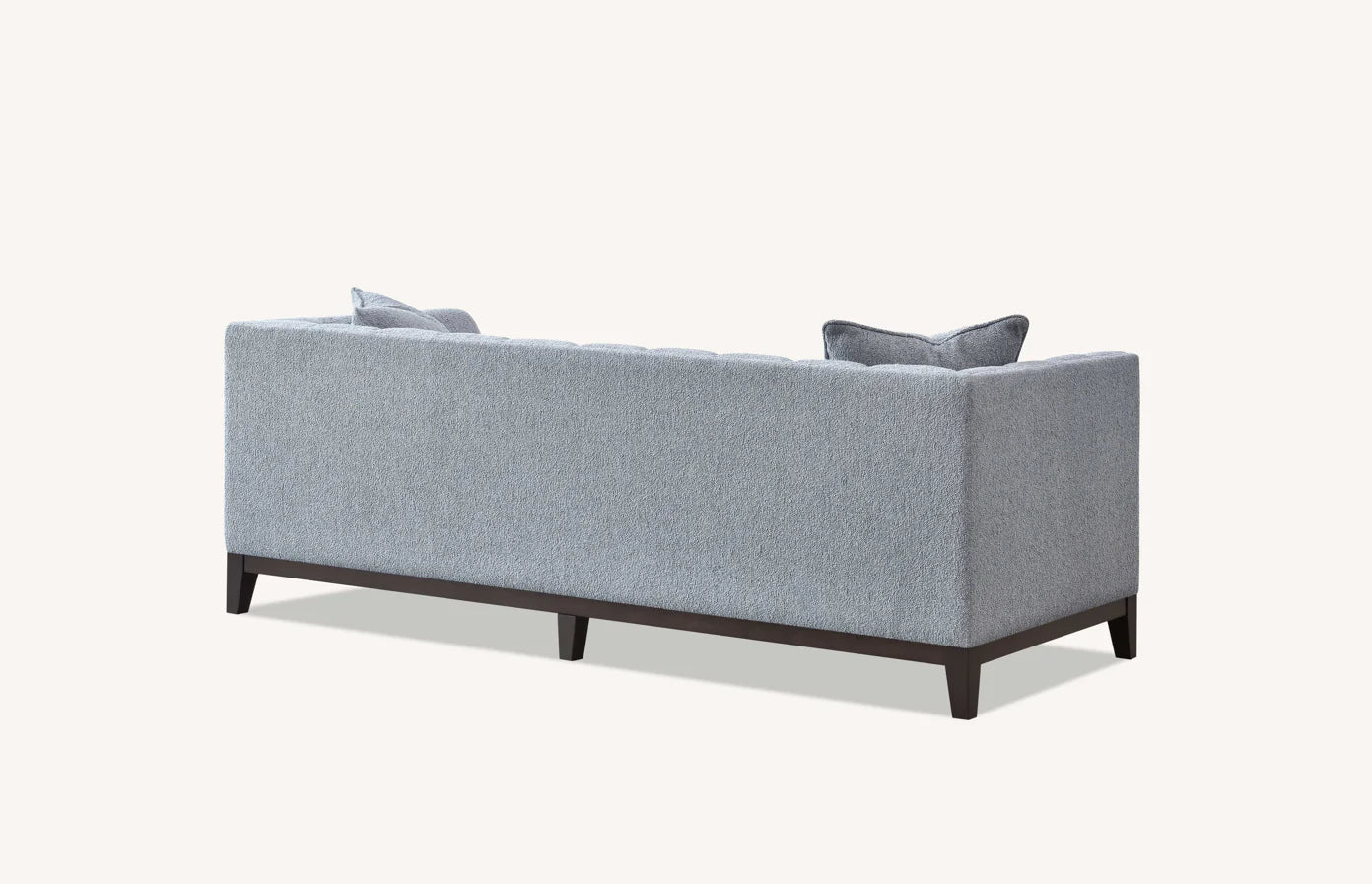 Shop the Aluxo Cooper 3 Seater Sofa, a timeless modern sofa built on a solid wooden frame, high density foam padding and a soft, textured boucle finish. Shop online today at www.nobleandnook.co.uk