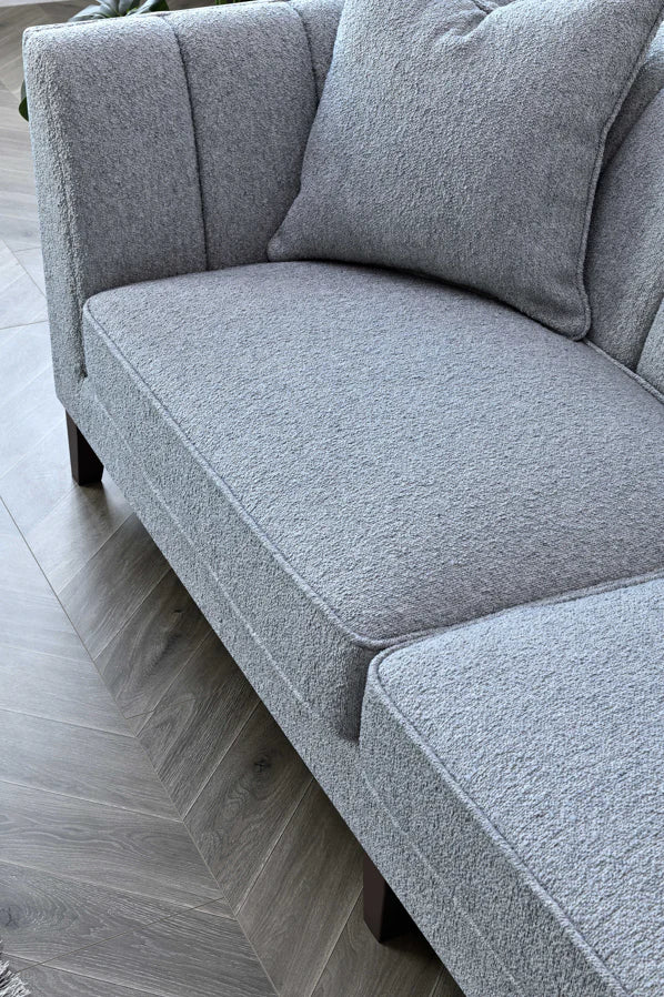 Shop the Aluxo Cooper 3 Seater Sofa, a timeless modern sofa built on a solid wooden frame, high density foam padding and a soft, textured boucle finish. Shop online today at www.nobleandnook.co.uk