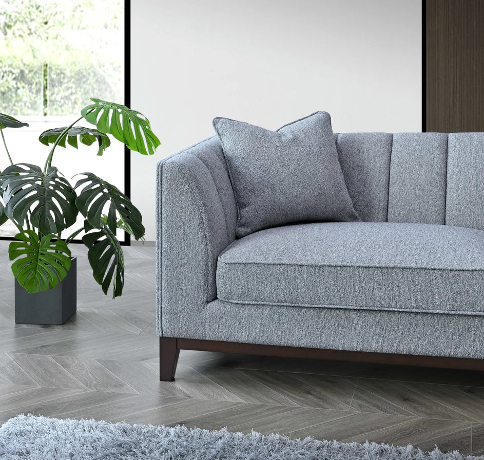 Shop the Aluxo Cooper 3 Seater Sofa, a timeless modern sofa built on a solid wooden frame, high density foam padding and a soft, textured boucle finish. Shop online today at www.nobleandnook.co.uk