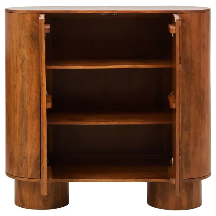 Shop the Torcino two door Mango Wood Cabinet in eco-friendly mango wood with intricately carved design. This item is pre-assembled. Shop online at www.nobleandnook.co.uk