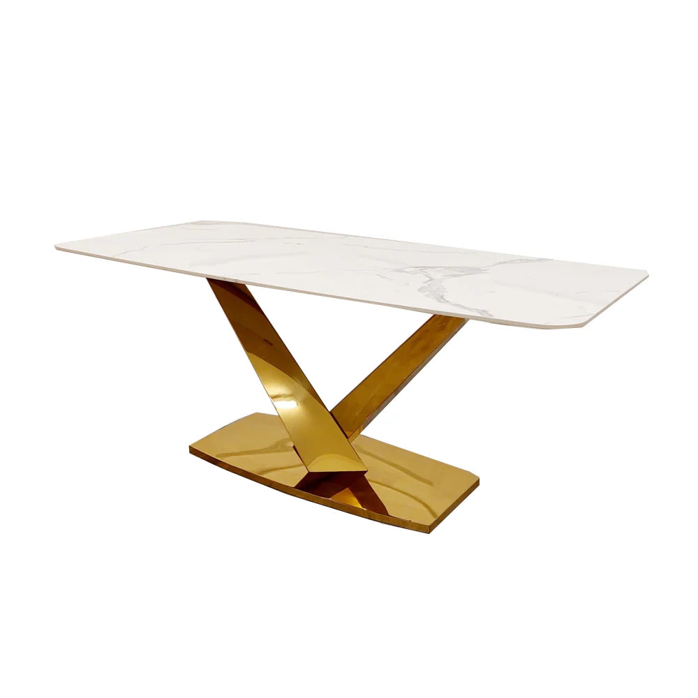The Valeo Gold Dining Table, a luxurious statement piece that seamlessly combines modern elegance with exceptional craftsmanship. Shop online today at www.nobleandnook.co.uk