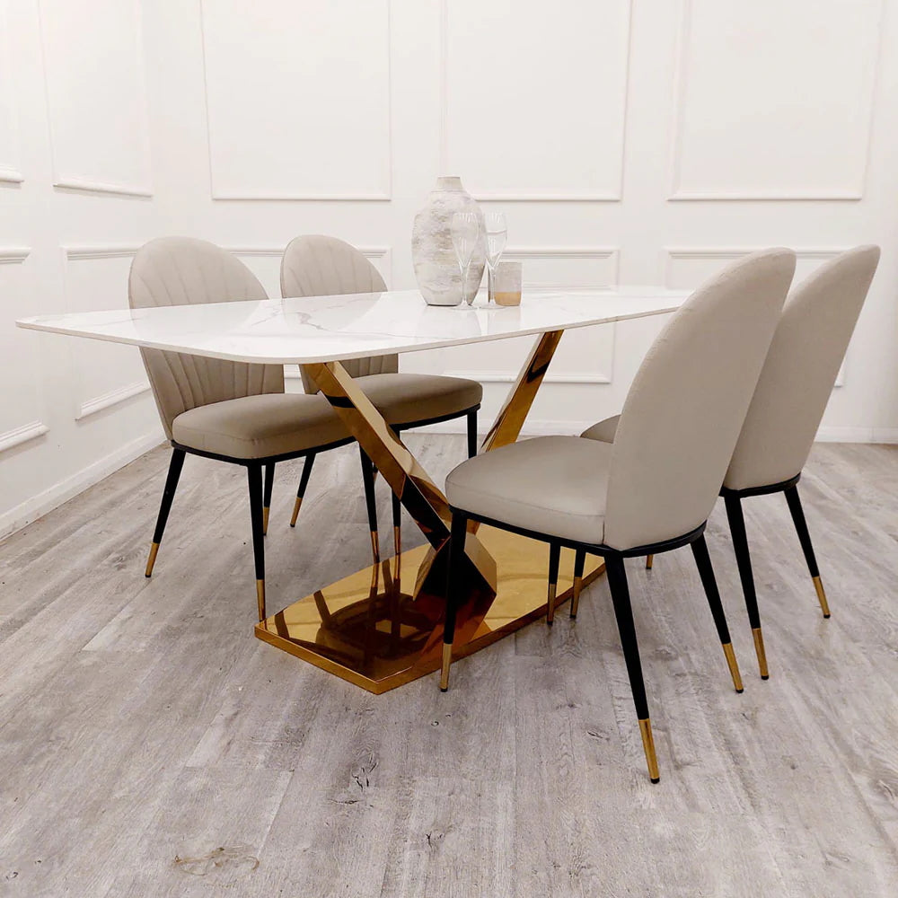 The Valeo Gold Dining Table, a luxurious statement piece that seamlessly combines modern elegance with exceptional craftsmanship. Shop online today at www.nobleandnook.co.uk