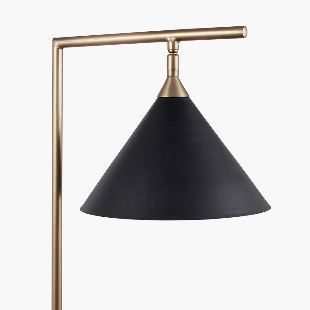The Zeta Floor Lamp, featuring a sleek combination of matte black and antique brass metal. FREE UK MAINLAND DELIVERY. Shop online now at www.nobleandnook.co.uk