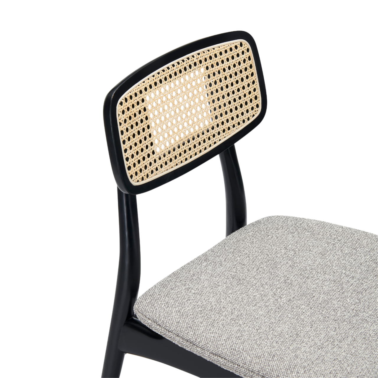 Shop the Elder Dining Chair with black ash wood frame with rattan open weave, combining bohemian and Scandinavian style by Twenty10 Designs. FREE UK MAINLAND DELIVERY. Shop online now at www.nobleandnook.co.uk