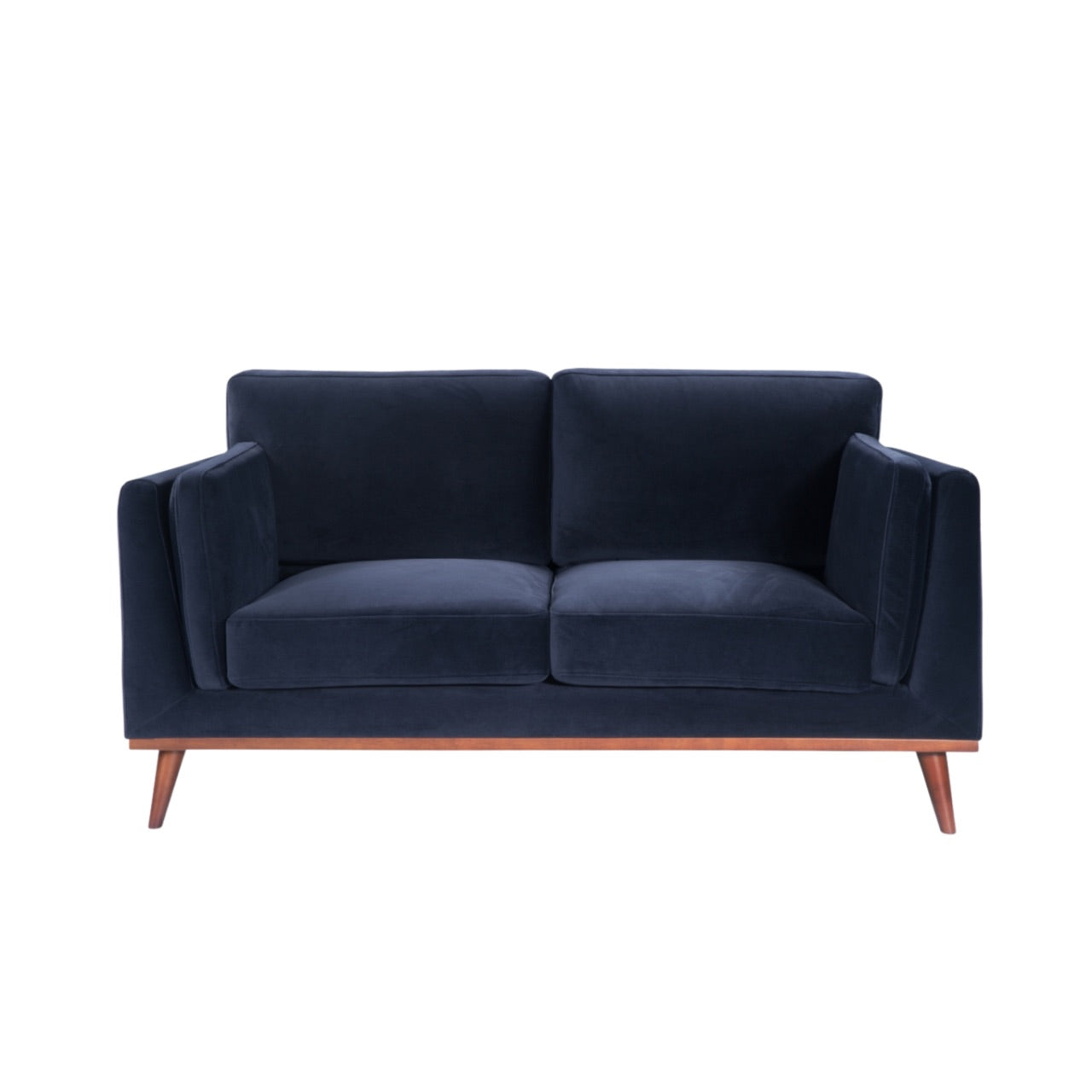Shop the Mickey 2 seater sofa in Midnight Blue velvet with a walnut frame and tapered walnut legs, its a contemporary masterpiece. Shop online today at www.nobleandnook.co.uk