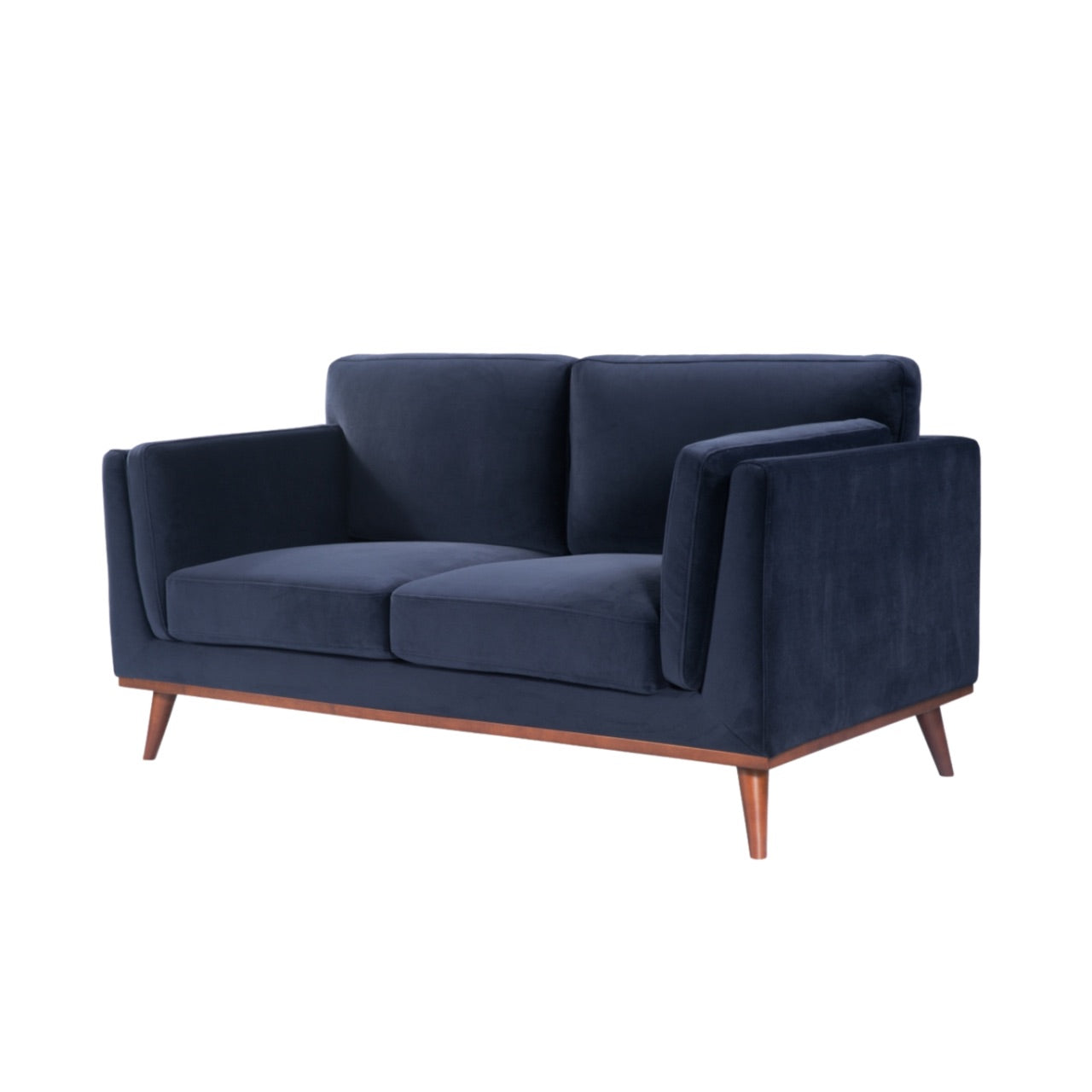 Shop the Mickey 2 seater sofa in Midnight Blue velvet with a walnut frame and tapered walnut legs, its a contemporary masterpiece. Shop online today at www.nobleandnook.co.uk