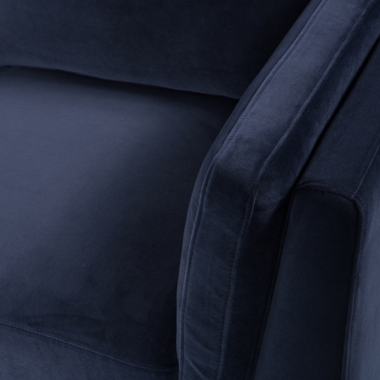 Shop the Mickey 2 seater sofa in Midnight Blue velvet with a walnut frame and tapered walnut legs, its a contemporary masterpiece. Shop online today at www.nobleandnook.co.uk