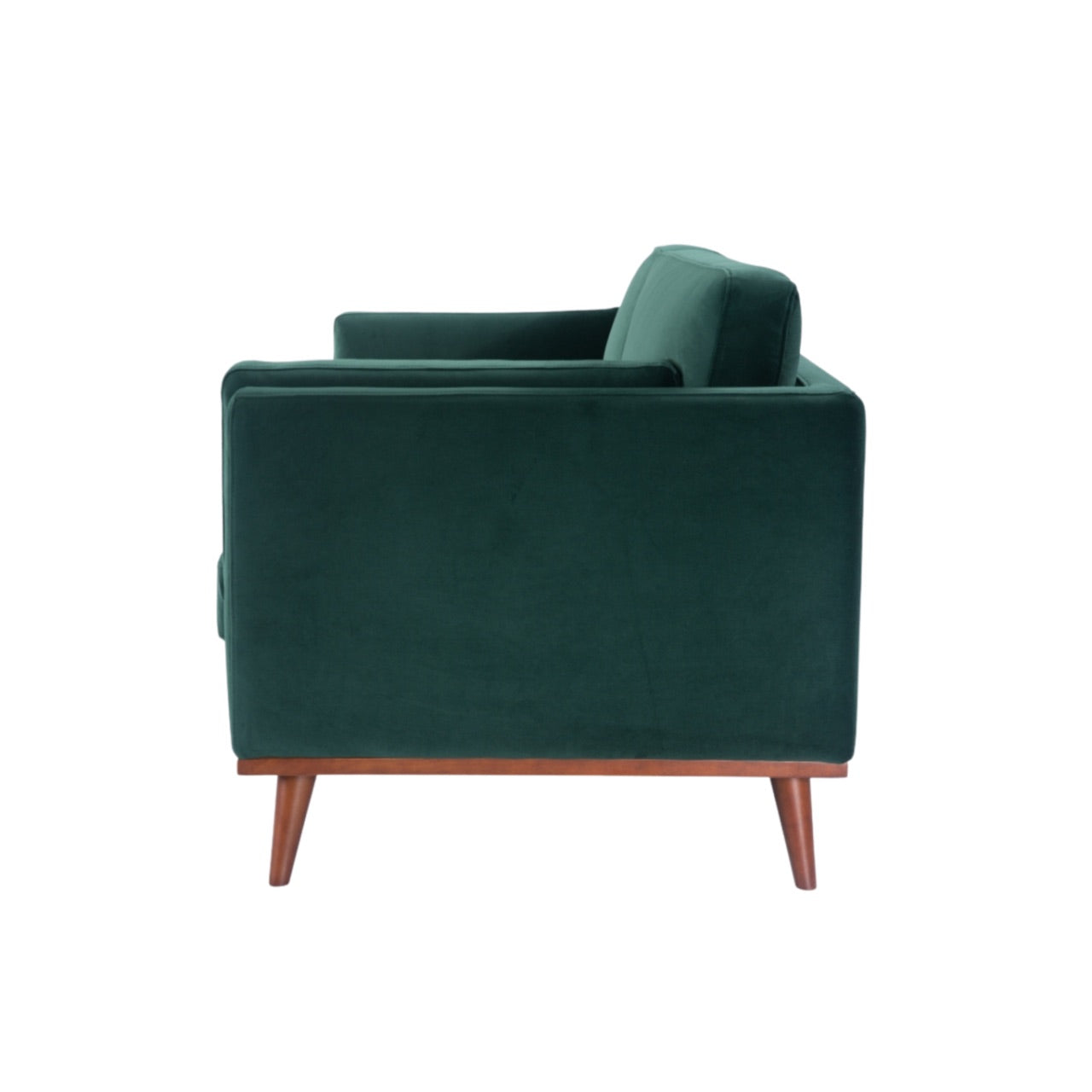 Shop the Mickey 2 seater sofa in on trend Emerald Green velvet with a walnut frame and tapered walnut legs, a contemporary masterpiece. Shop online today at www.nobleandnook.co.uk