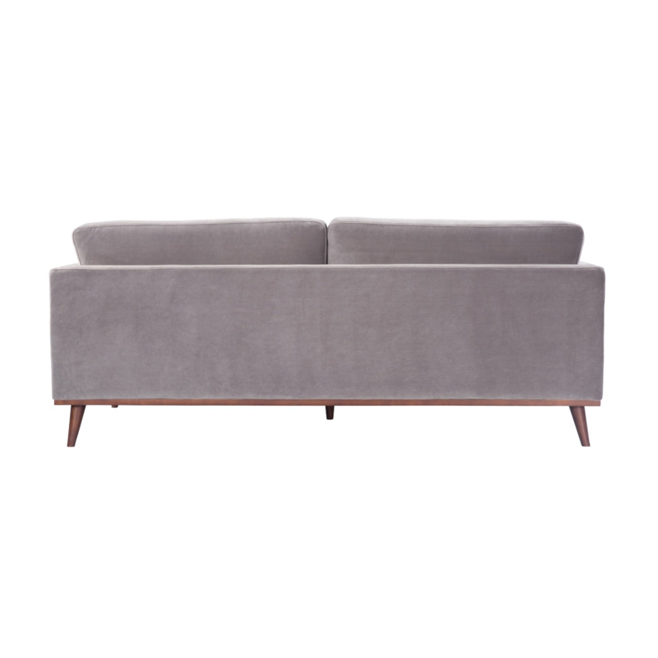 Shop the Mickey 3 Seat Sofa in a fashionable grey velvet hue with tapered walnut legs. This is a contemporary masterpiece. Shop online today at www.nobleandnook.co.uk