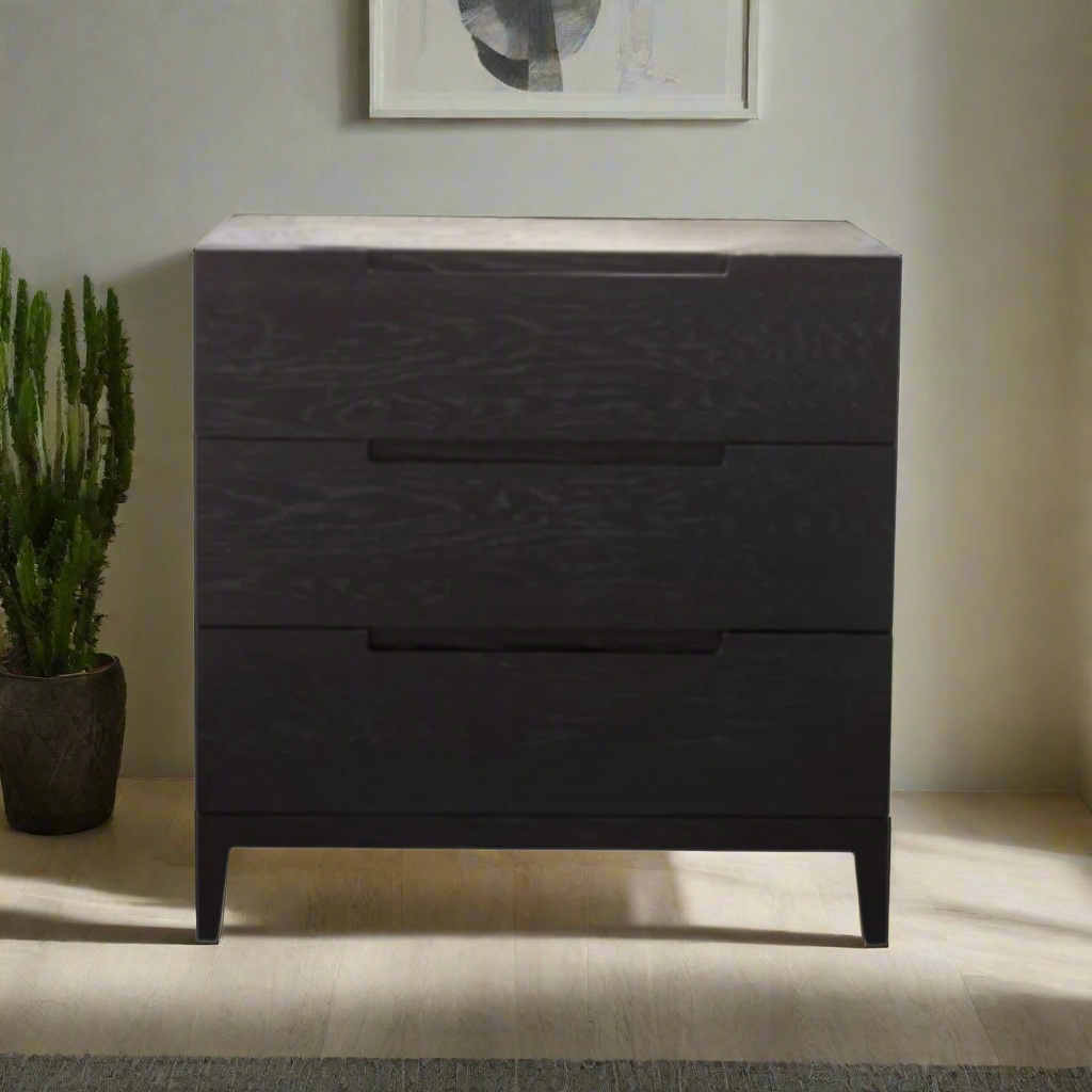 The Orchid 3 Drawer Chest, finished in a refined Black stained Oak, along with cut-out handles and tapered legs for a luxurious touch. FREE UK Mainland Delivery. Shop online today at www.nobleandnook.co.uk