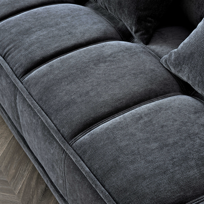 Shop the Aluxo Gramercy 3 Seater Sofa in Steel Velvet, featuring block stitched seat cushions and stunning steel-coloured mermaid boucle fabric for a modern luxury with timeless opulence. Shop online today at www.nobleandnook.co.uk