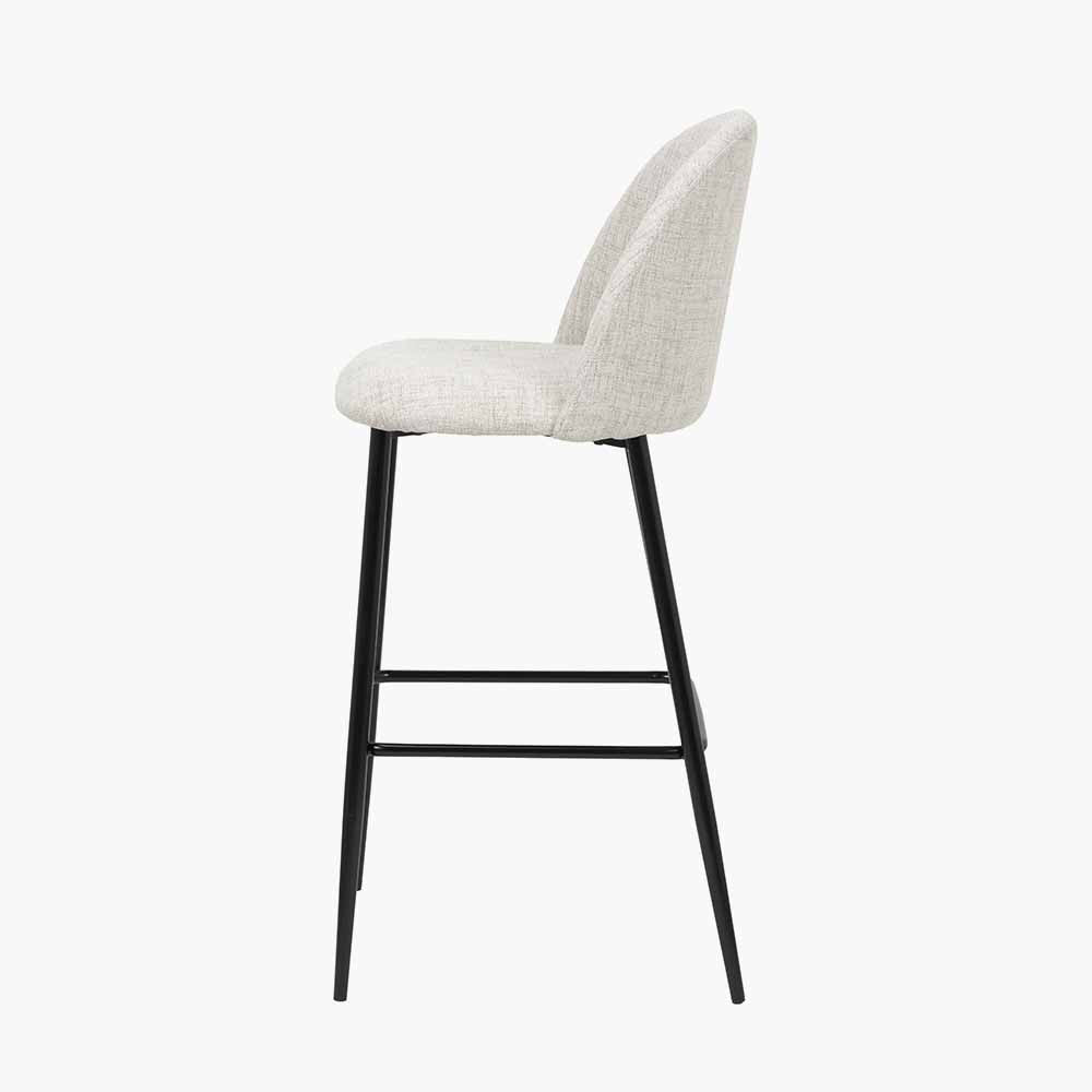 Refine your space with the Turi Pebble Linen Mix and Black Metal Bar Stool with gently curved backrest and soft pebble-toned linen mix upholstery. Shop online today at www.nobleandnook.co.uk