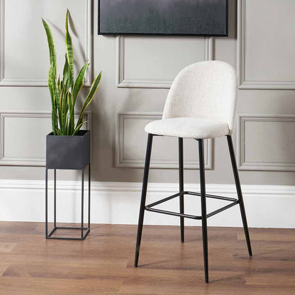 Refine your space with the Turi Pebble Linen Mix and Black Metal Bar Stool with gently curved backrest and soft pebble-toned linen mix upholstery. Shop online today at www.nobleandnook.co.uk
