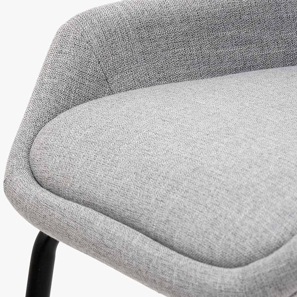The Alba Dining Chair, upholstered in a soft grey linen mix with a stitched back and slender black metal legs ensures it complements any décor. Shop online today at www.nobleandnook.co.uk