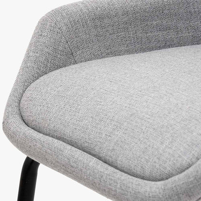 The Alba Dining Chair, upholstered in a soft grey linen mix with a stitched back and slender black metal legs ensures it complements any décor. Shop online today at www.nobleandnook.co.uk