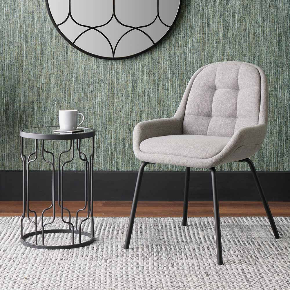 The Alba Dining Chair, upholstered in a soft grey linen mix with a stitched back and slender black metal legs ensures it complements any décor. Shop online today at www.nobleandnook.co.uk