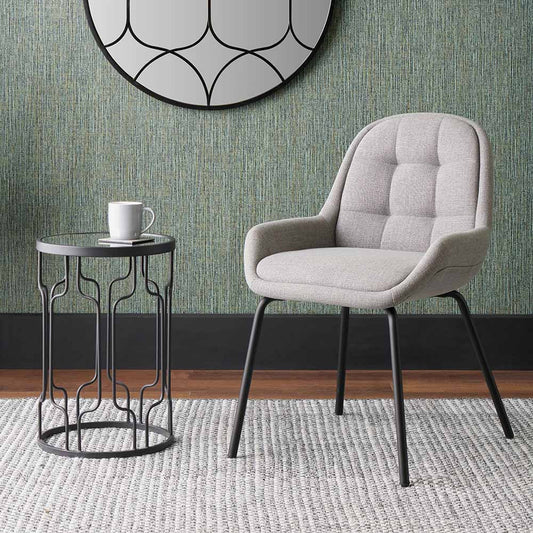 The Alba Dining Chair, upholstered in a soft grey linen mix with a stitched back and slender black metal legs ensures it complements any décor. Shop online today at www.nobleandnook.co.uk