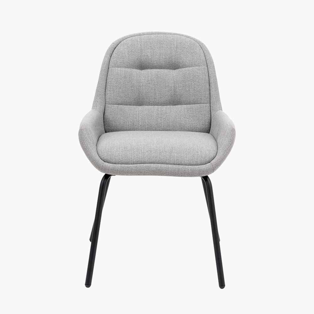 The Alba Dining Chair, upholstered in a soft grey linen mix with a stitched back and slender black metal legs ensures it complements any décor. Shop online today at www.nobleandnook.co.uk