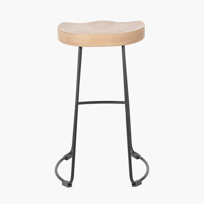 Enhance your seating area with this minimalist bar stool featuring a solid ash wood seat paired with black metal legs, creating a striking contrast that suits contemporary interiors. Shop online today at www.nobleandnook.co.uk