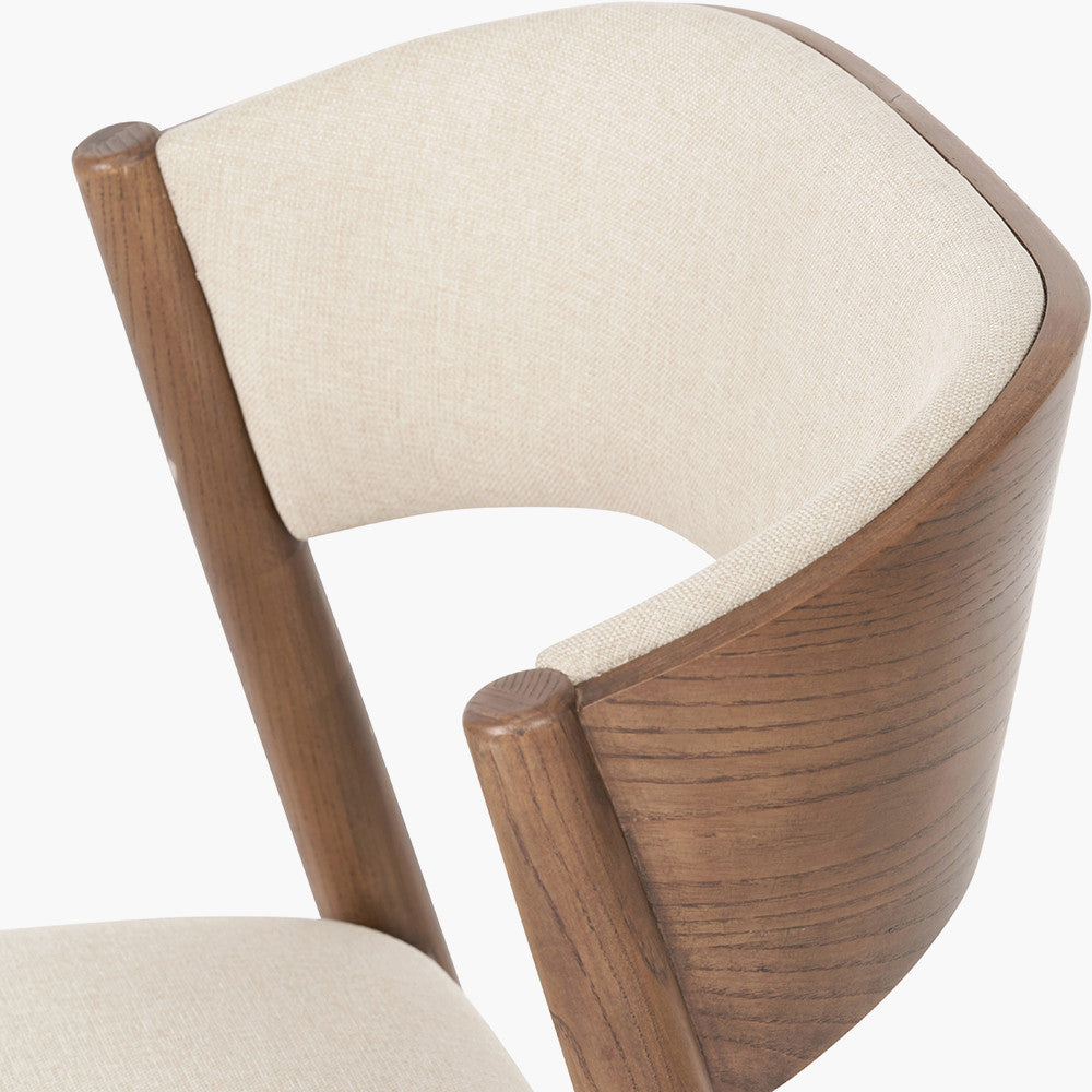 Shop the Elias Dining Table and 6 matching Chairs, blending minimalist elegance with Scandinavian-inspired design. Expertly crafted from solid ash wood with a stylish on-trend dark finish. Shop online today at www.nobleandnook.co.uk