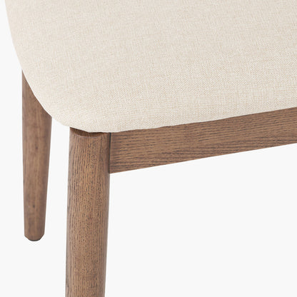 Shop the Elias Dining Table and 6 matching Chairs, blending minimalist elegance with Scandinavian-inspired design. Expertly crafted from solid ash wood with a stylish on-trend dark finish. Shop online today at www.nobleandnook.co.uk