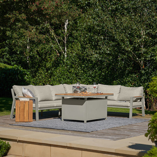Enhance your outdoor living with the Stockholm Limestone Outdoor Corner Seating Set including Fire Pit Table, perfect for garden entertaining and relaxation. Shop today at www.nobleandnook.co.uk