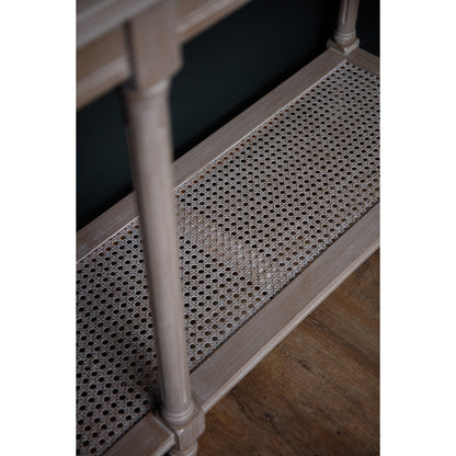 Buy the Serene Rattan Large Console Table. Dimensions - L40xW160xH80cm . Blending natural charm with contemporary elegance and featuring an intricately woven rattan frame and a sleek, tempered top, its generous size and refined silhouette make it a standout piece in any space.