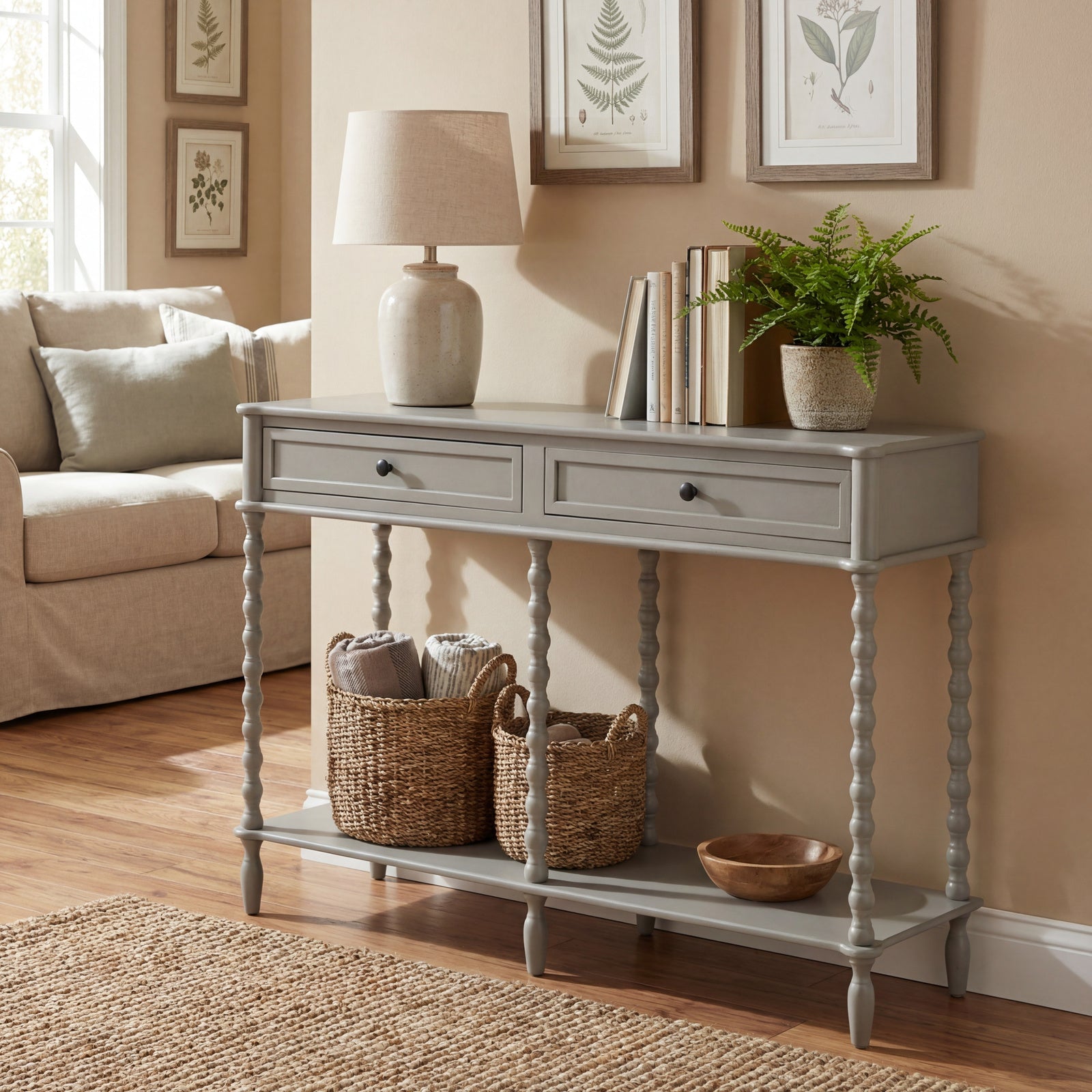 Grey console table in a living room with decor items