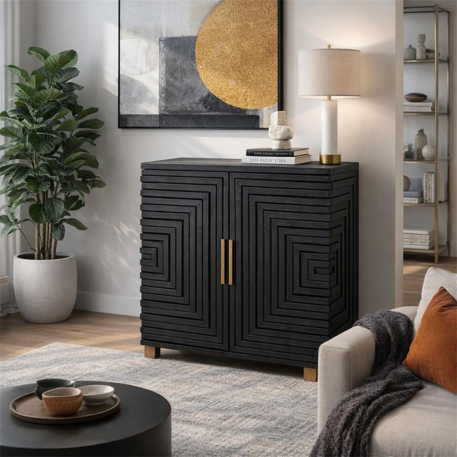 Modern living room with a black cabinet, plant, and sofa.