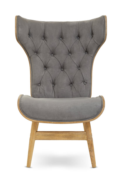 Shop the Dark Grey Velvet Chair with Winged Back, a touch of timeless elegance to any room. A tufted velvet seat, sleek winged design, and sturdy elmwood frame. SHop online today at www.nobleandnook.co.uk