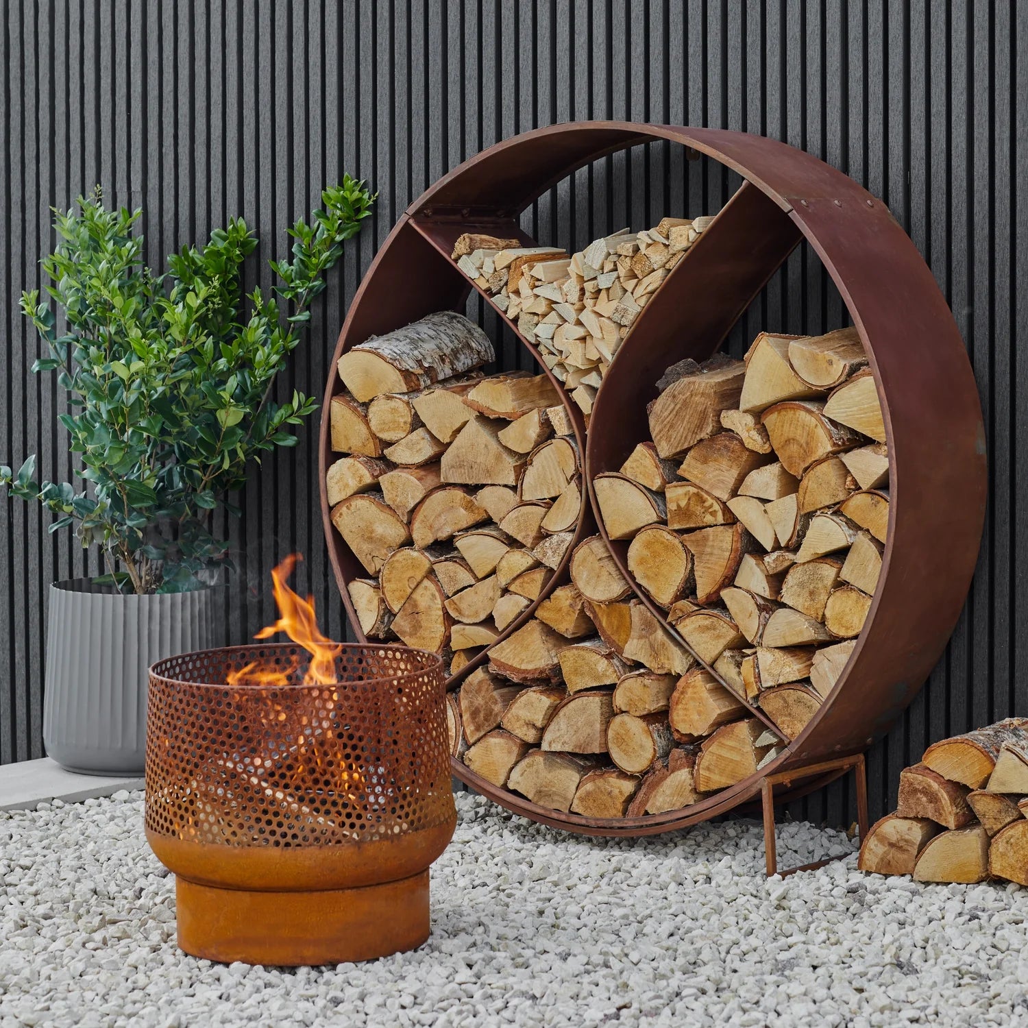 Shop the Circle Sculptural Log Storage and add a touch of modern art and function to your garden. Made with premium quality and ethically sourced metal. Shop online today at www.nobleandnook.co.uk