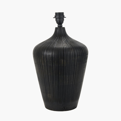 Black ribbed vase-like lamp on a white background