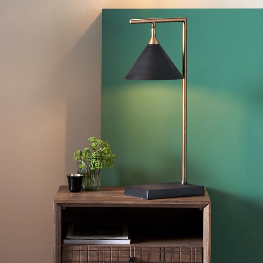 Elevate your interior with the Zeta Table Lamp, a stylish and practical lighting solution for modern homes. With its sleek matt black and antique brass finish. Available today at www.nobleandnook.co.uk