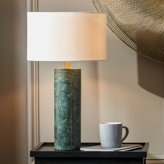 Shop the Venetia Green Marble and Gold Metal Tall Table Lamp with inlaid brass, creating a modern and elegant look. FREE UK MAINLAND DELIVERY. Shop online now at www.nobleandnook.co.uk