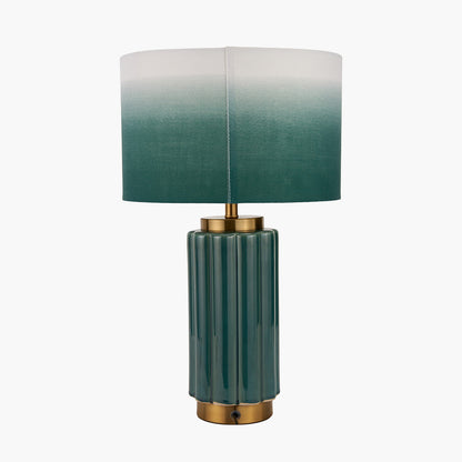 Green table lamp with a gradient shade on a white background