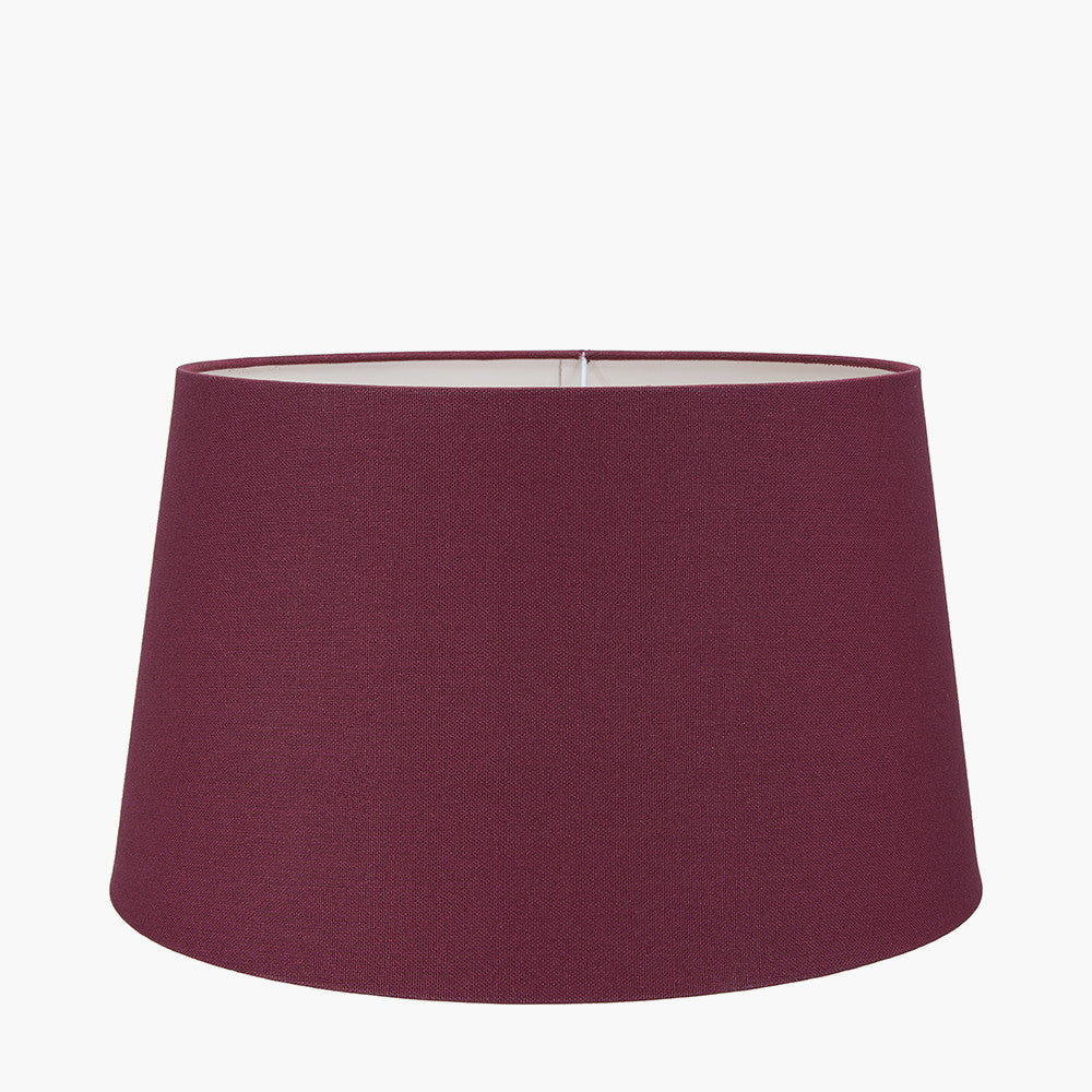 Maroon lampshade on a white background