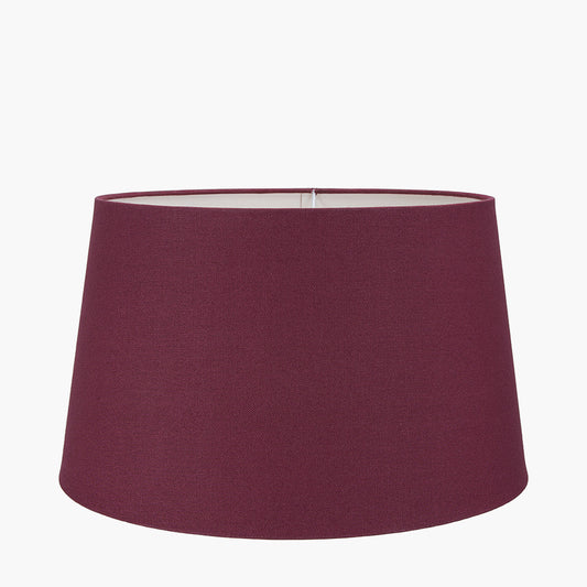 Maroon lampshade on a white background