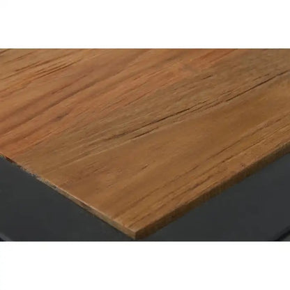 Featuring a refined balance of materials, its clear glass top is perfectly framed by a black metal structure, complemented by a warm teak wood shelf below. Shop online today at www.nobleandnook.co.uk