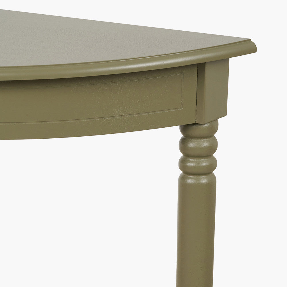 Close-up of a green wooden table with a white background