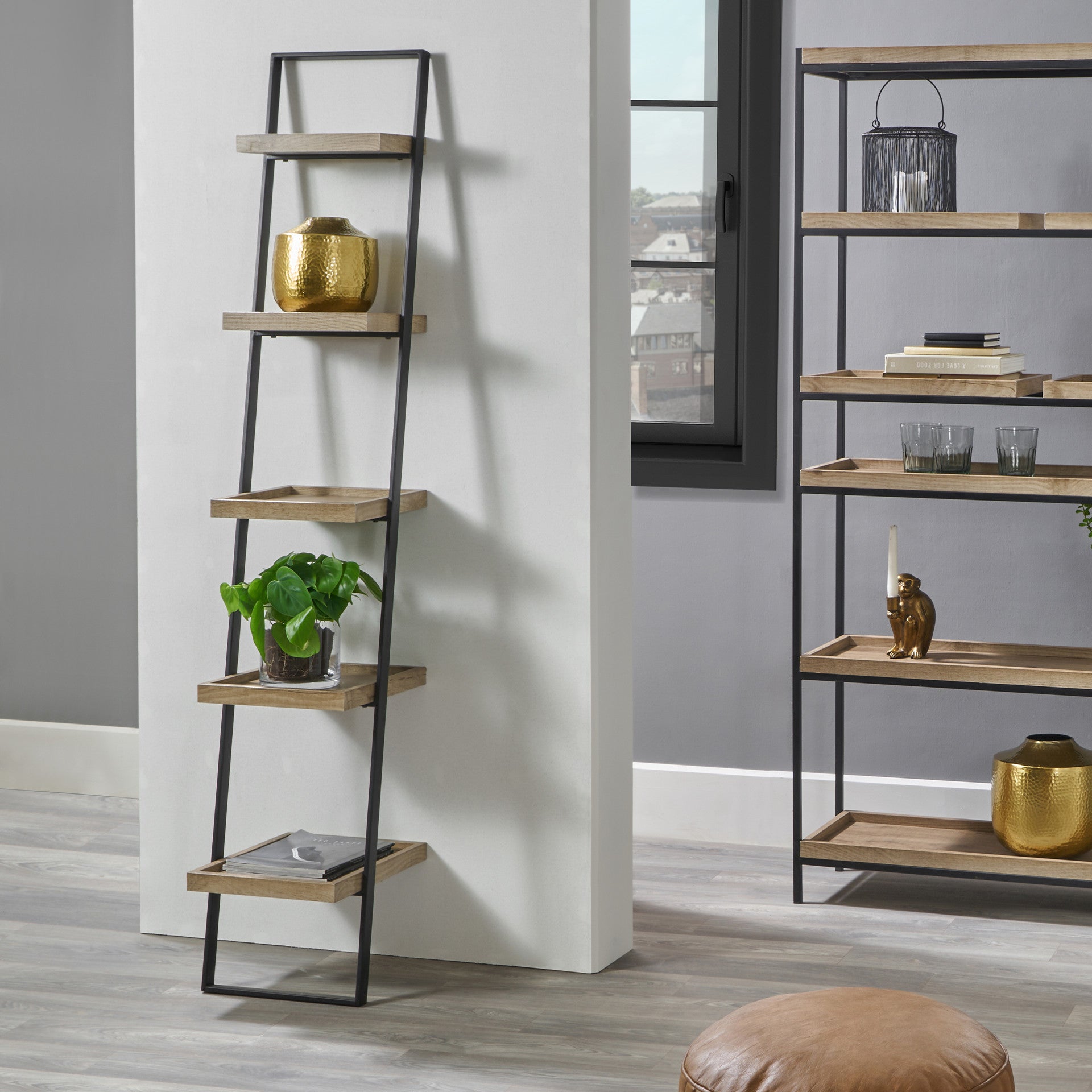 Elevate your home with the Gallery 5 Shelf Ladder Unit. Crafted with a matte black metal frame and natural wood veneer shelves. Dimensions W34xD36xH181cm. Shop online today at www.nobleandnook.co.uk