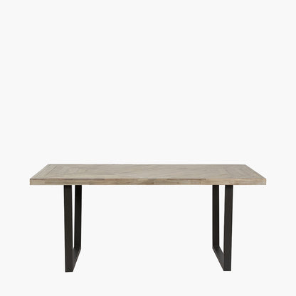 Shop the Marca Sand Wash Dining Table crafted from luxurious Acacia wood with a unique black metal leg design. Shop online now at www.nobleandnook.co.uk