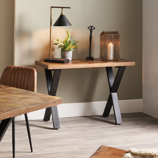 Hand crafted from recycled mango wood for an eco-friendly choice with inlaid brass-coloured detailing with triangular geo pattern for visual impact. W108xD41.5xH75.5cm. Shop online today at www.nobleandnook.co.uk