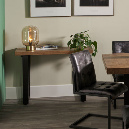 The Pahoja Console Table with an intricate inlaid mango wood top and black black iron legs offering a modern edge, perfect functional accent in any space. Available now at www.nobleandnook.co.uk
